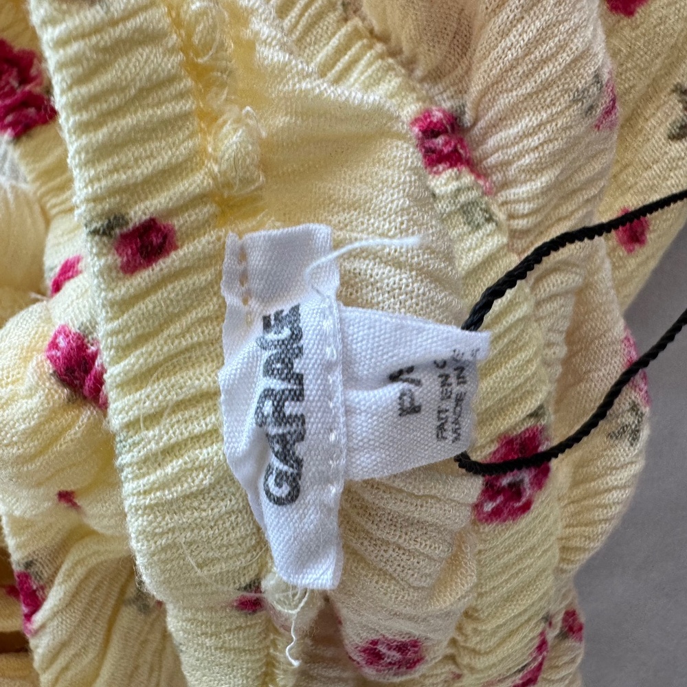 yellow halter top with pink flowers